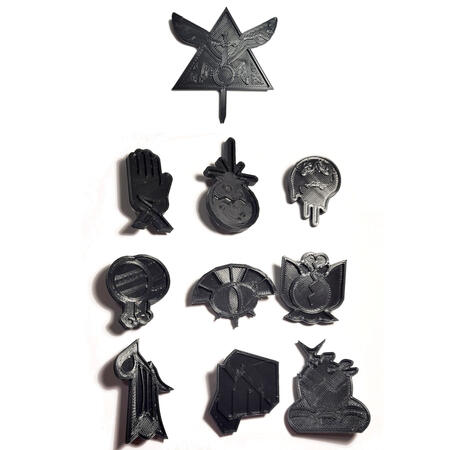 Pins of all ten coven symbols from the Owl House
